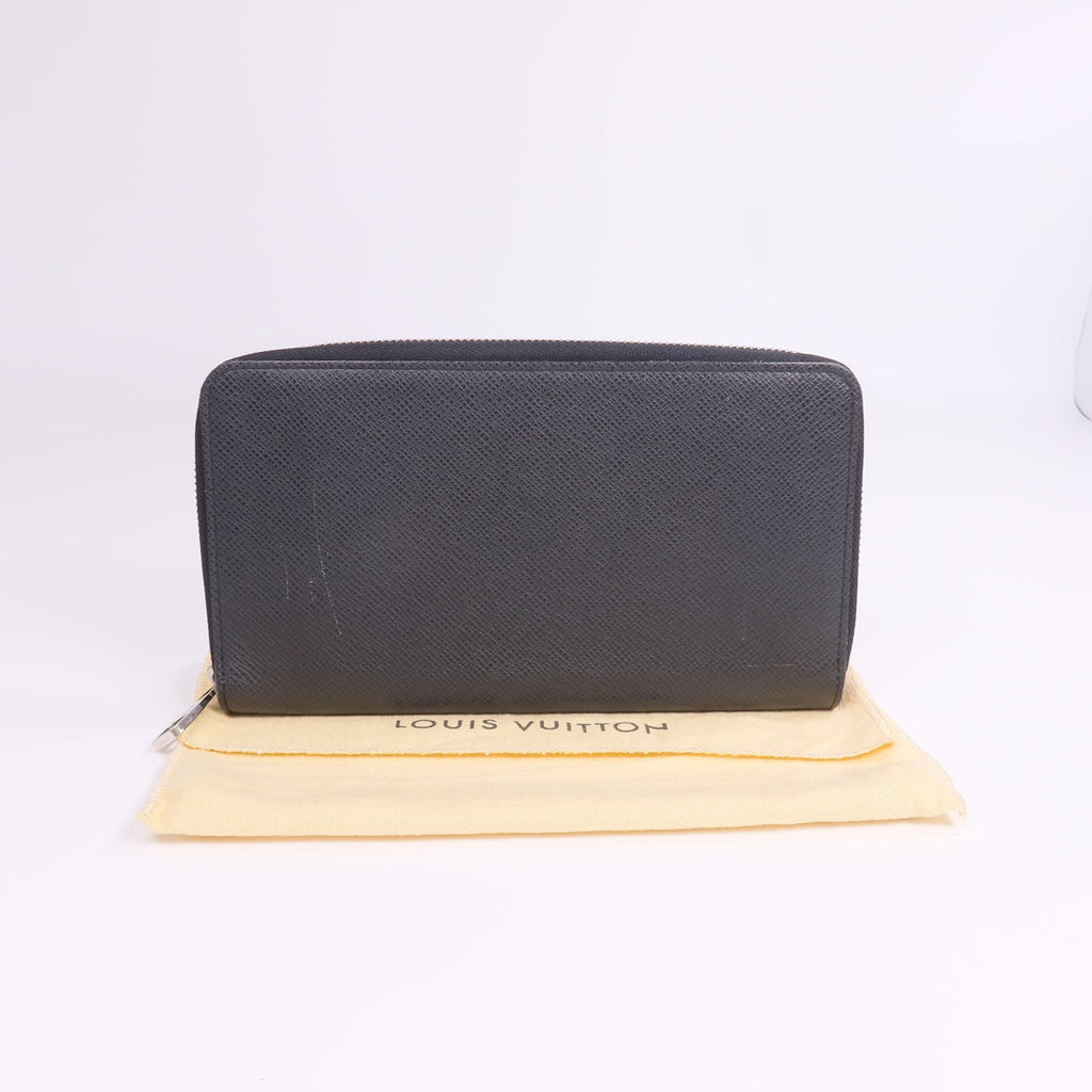 Louis Vuitton Tiga · Calfskin Zip Wallet
