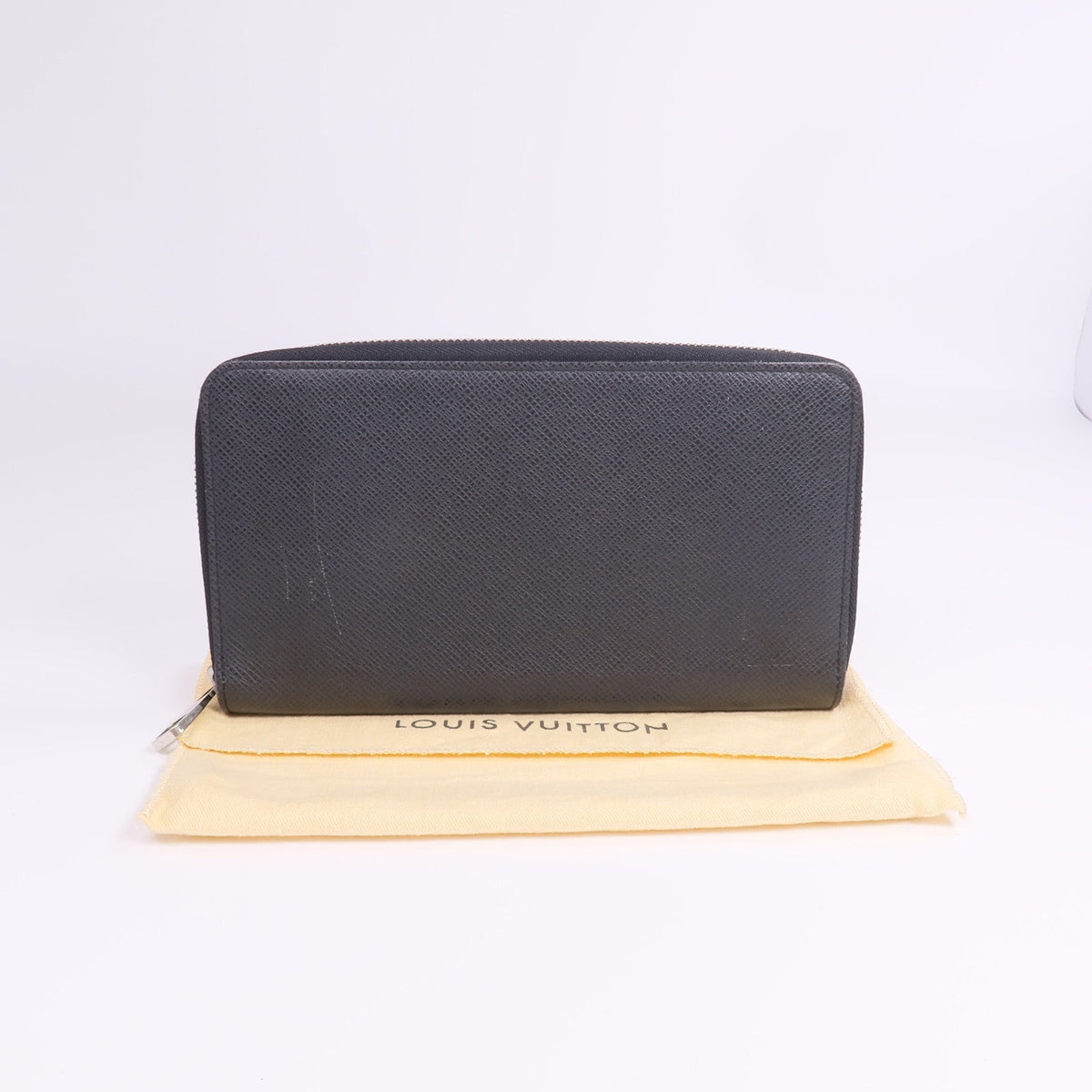Louis Vuitton Tiga · Calfskin Zip Wallet