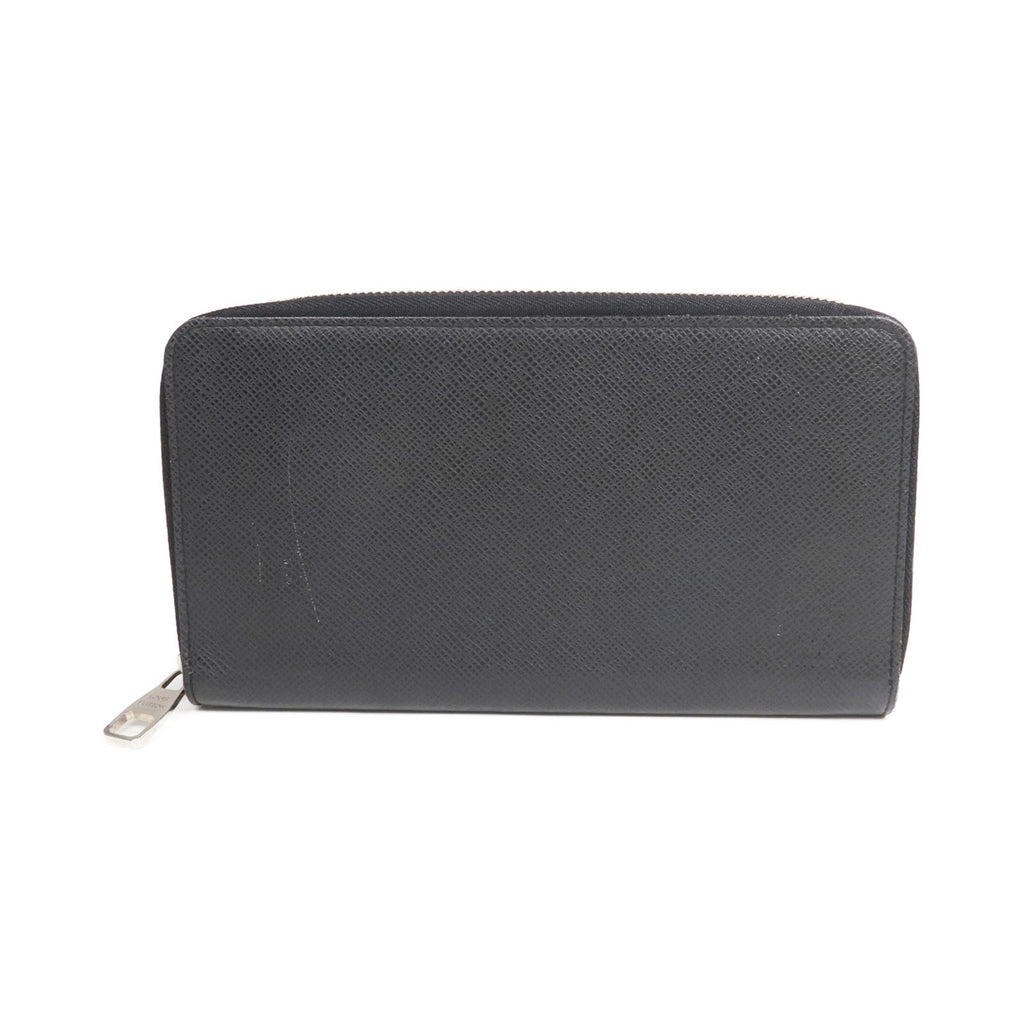 Louis Vuitton Tiga · Calfskin Zip Wallet