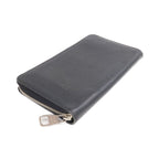 Louis Vuitton Tiga · Calfskin Zip Wallet