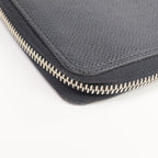 Louis Vuitton Tiga · Calfskin Zip Wallet