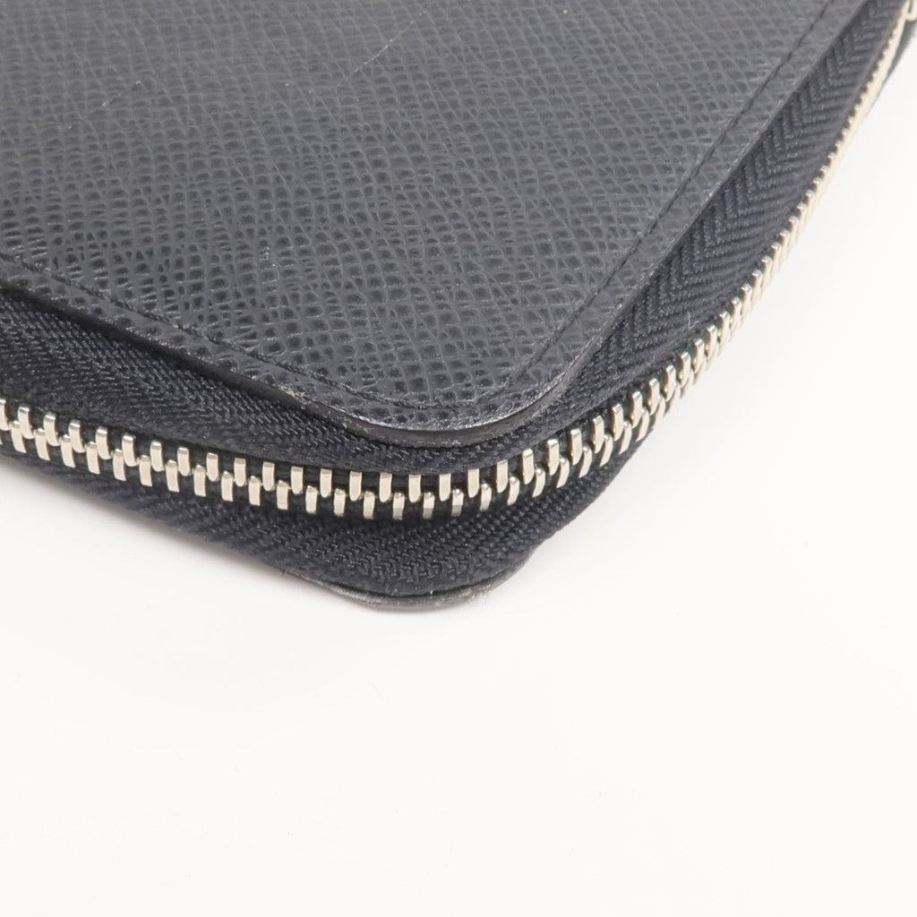 Louis Vuitton Tiga · Calfskin Zip Wallet