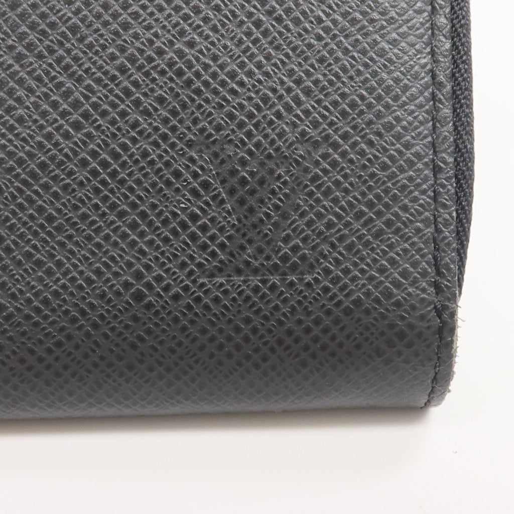Louis Vuitton Tiga · Calfskin Zip Wallet