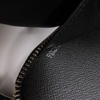 Louis Vuitton Tiga · Calfskin Zip Wallet