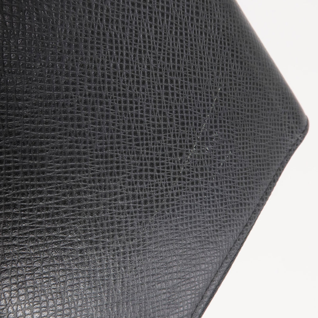 Louis Vuitton Tiga · Calfskin Zip Wallet