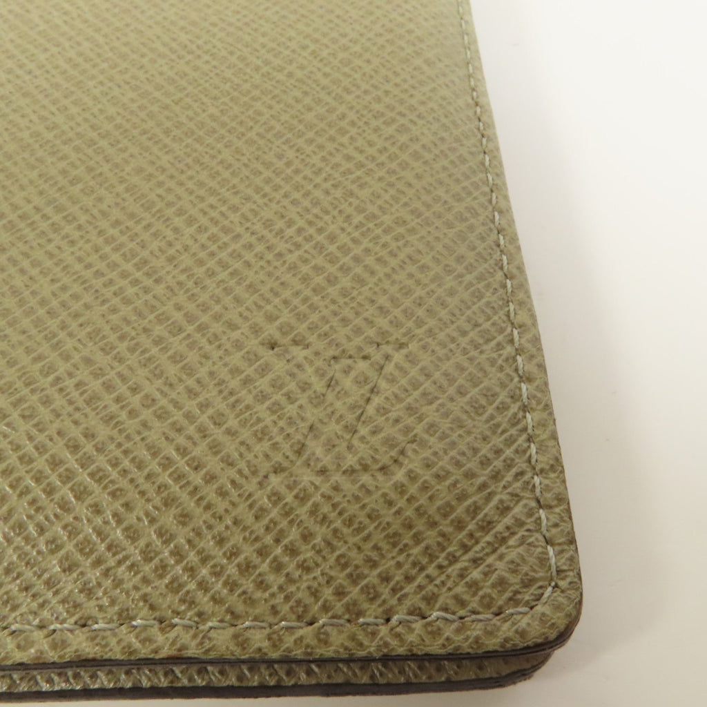 Louis Vuitton · Taiga Calfskin Wallet