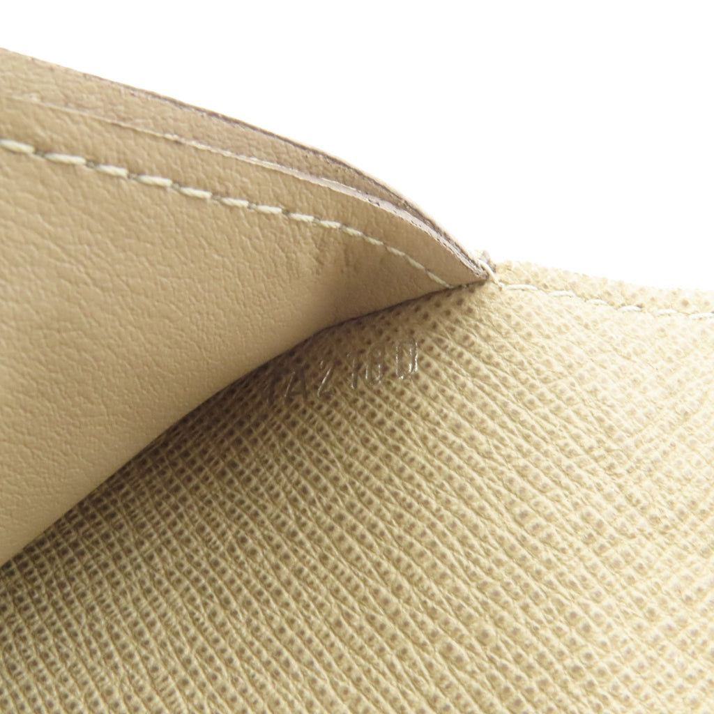 Louis Vuitton · Taiga Calfskin Wallet
