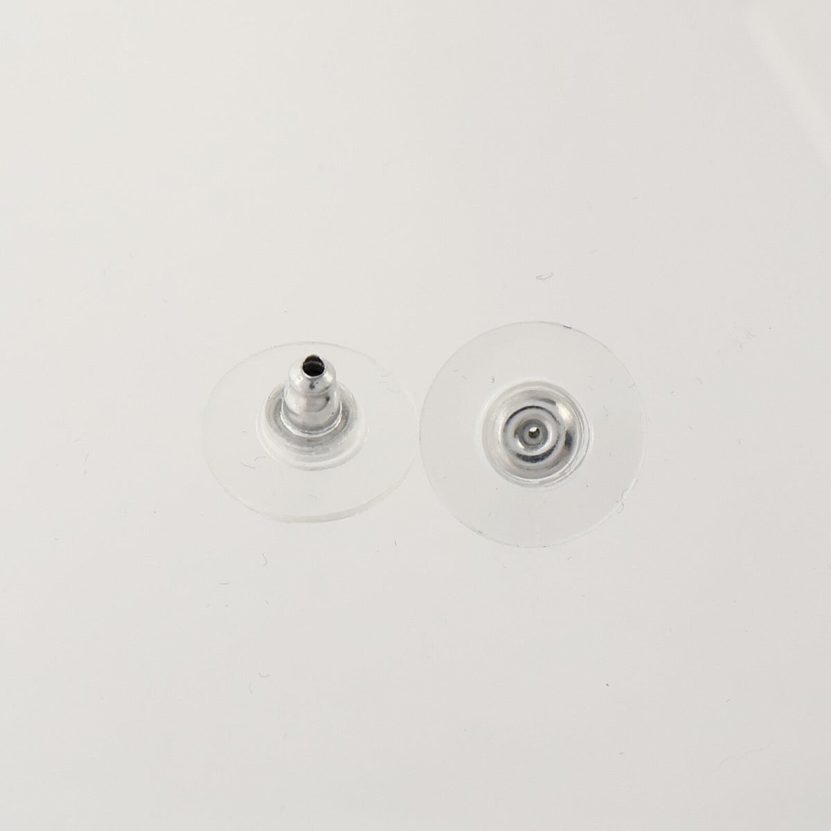 Chanel CC Earrings · Resin