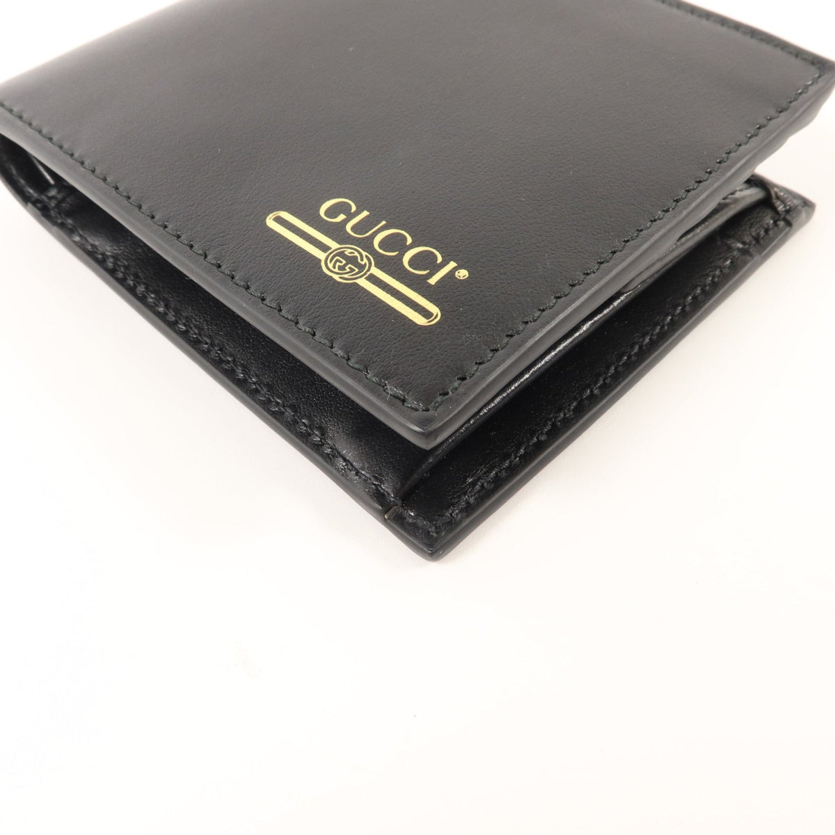 Gucci GG · Calfskin Bifold Wallet