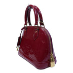 LOUIS VUITTON Alma · Vernis