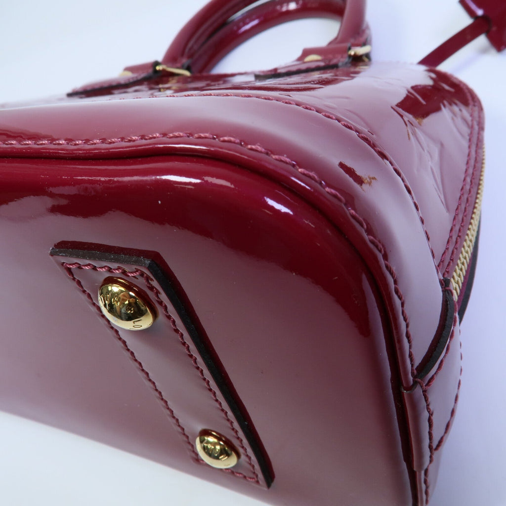 LOUIS VUITTON Alma · Vernis