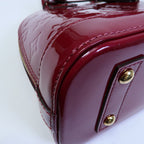 LOUIS VUITTON Alma · Vernis
