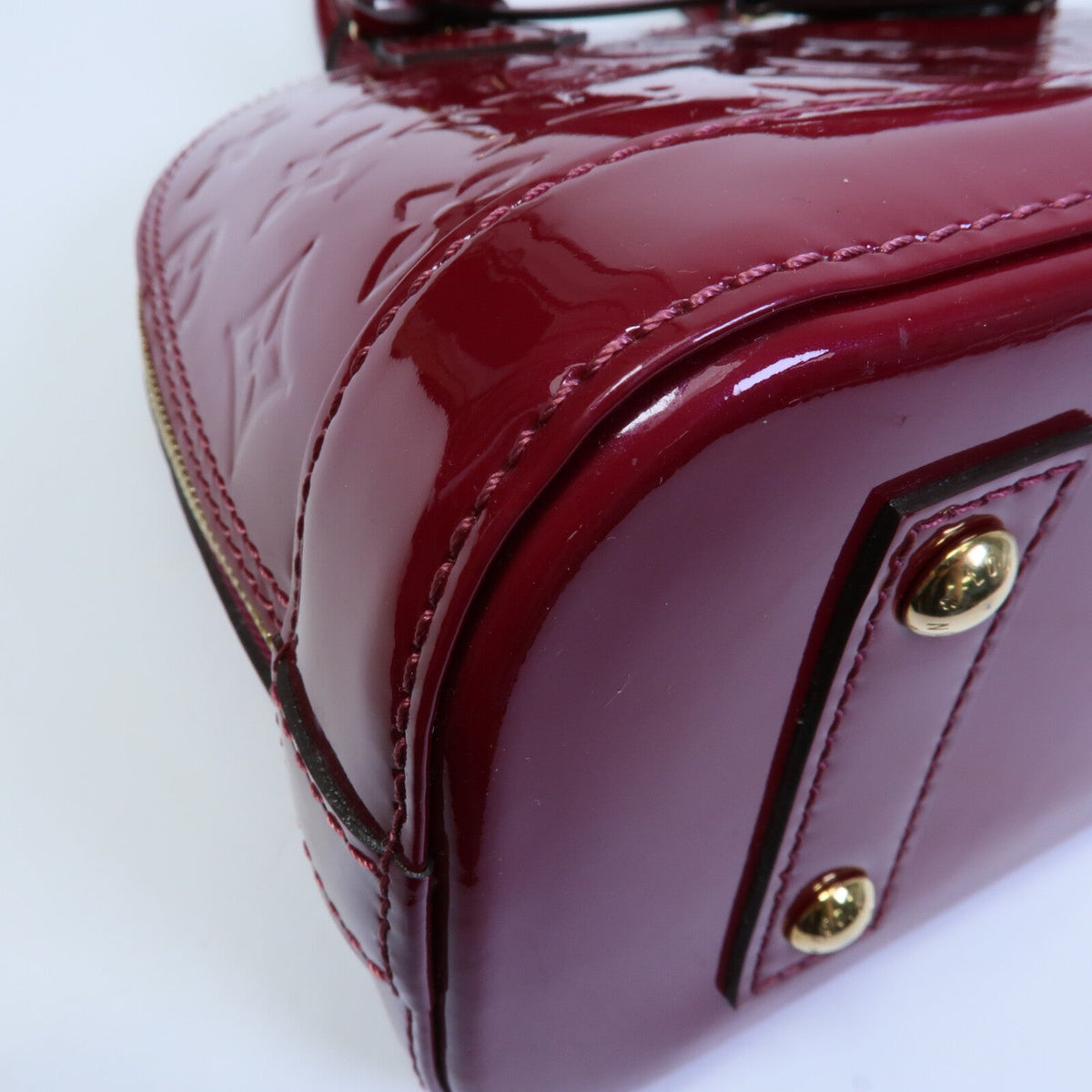 LOUIS VUITTON Alma · Vernis