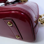 LOUIS VUITTON Alma · Vernis