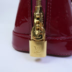 LOUIS VUITTON Alma · Vernis