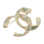 Chanel CC Brooch · Metal