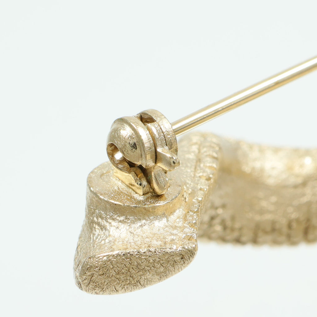 Chanel CC Brooch · Metal