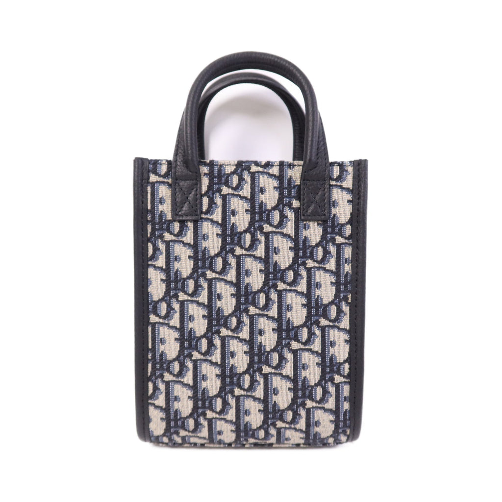 Dior Safari · Calfskin Canvas