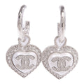 Chanel CC Earrings · Metal