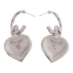 Chanel CC Earrings · Metal