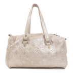 Louis Vuitton Comete · Monogram Shimmer