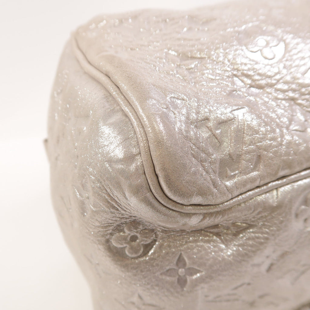 Louis Vuitton Comete · Monogram Shimmer