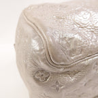Louis Vuitton Comete · Monogram Shimmer
