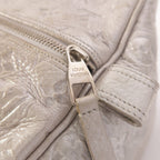 Louis Vuitton Comete · Monogram Shimmer