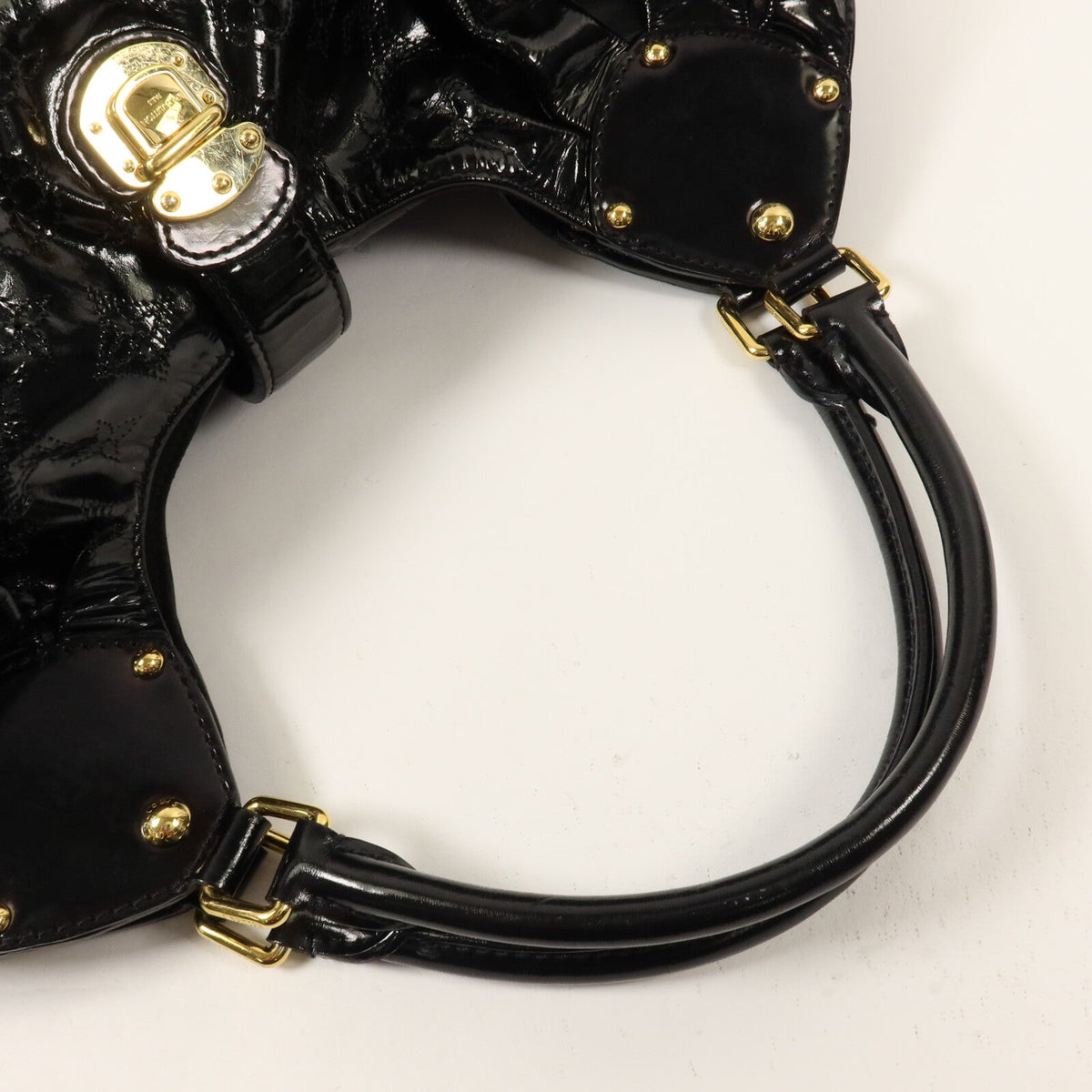 Louis Vuitton Surya L · Mahina Patent