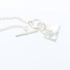 Hermès Amulette Kelly · Sterling Silver