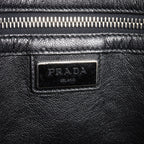 Prada · Saffiano Leather Messenger