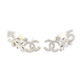 Chanel CC Earrings · Metal