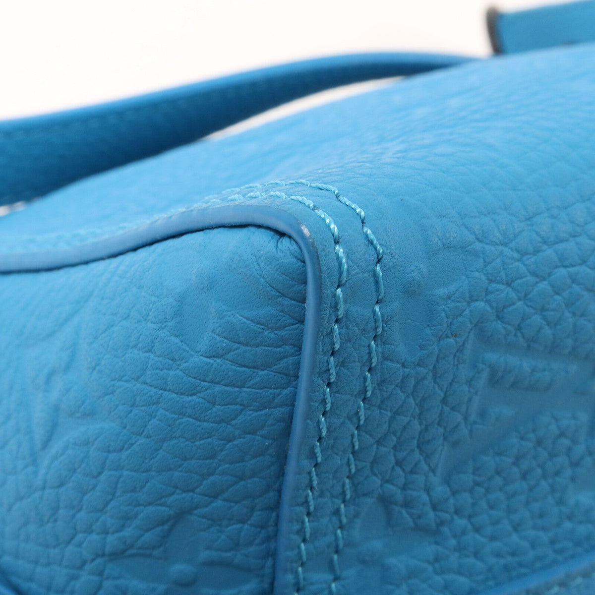 LOUIS VUITTON Triangle · Monogram Empreinte