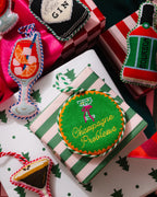 Needlepoint Ornament - Champagne Problems
