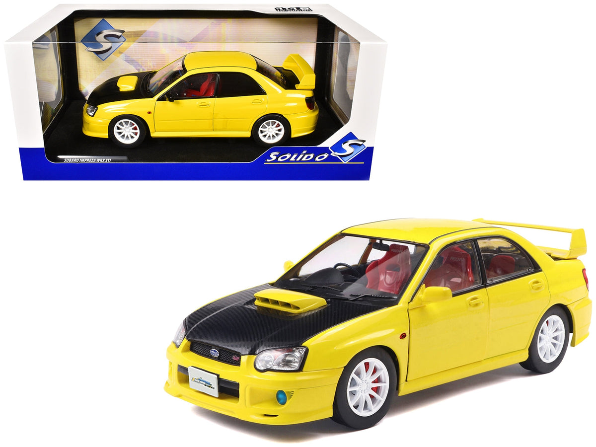 2003 Subaru Impreza WRX STI RHD (Right Hand Drive) Yellow with Carbon Hood 1/18 Diecast Model Car by Solido