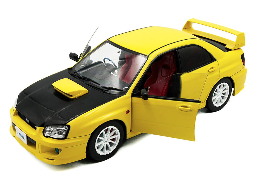 2003 Subaru Impreza WRX STI RHD (Right Hand Drive) Yellow with Carbon Hood 1/18 Diecast Model Car by Solido