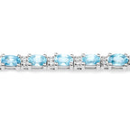 8.84 Carat Genuine Blue Zircon and Topaz White .925 Sterling Silver Bracelet