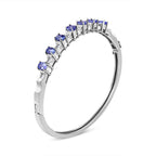 14K White Gold 5 MM Oval Blue Tanzanite and 1/4 Cttw Diamond Bangle (H-I Color, VS2-SI1 Clarity) - Fits wrists up to 7 1/2 Inches