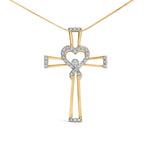 14K Yellow Gold Plated .925 Sterling Silver 1/6 Cttw Diamond Interlocking Heart and Ribbon Cross Pendant Necklace (H-I Color, I2-I3 Clarity) - 18" Inches