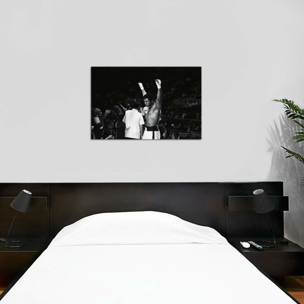 Muhammad Ali With Hands Raised // Muhammad Ali Enterprises