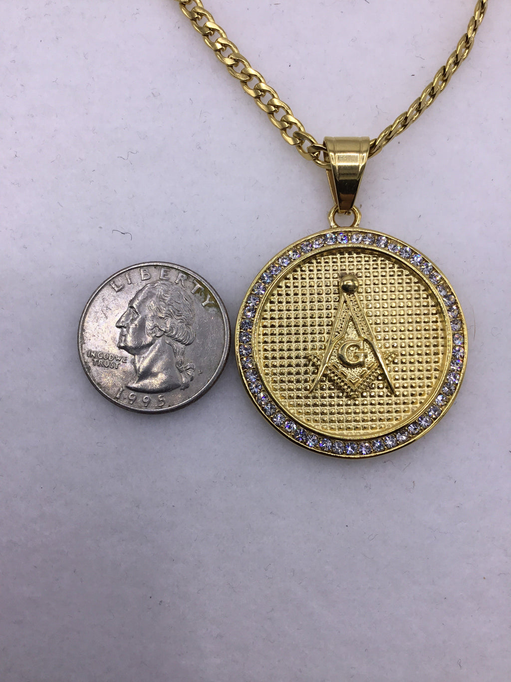 18k gold over stainless steel Medallion with Cubic Zirconia includes Cuban link chain set